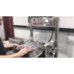 Custom Pak Hi-production vacuum packaging system